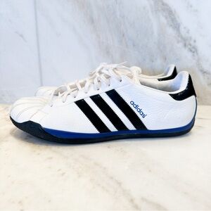 ADIDAS Men's White and Black Athletic Shoes with Blue Accents